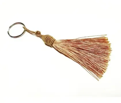 Chaveiro tassel dourado - Comprar e Usar